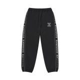 BLACK EYE PATCH (REFLECTIVE STENCIL LOGO TRACK PANTS) BLACK