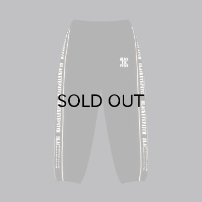 画像4: BLACK EYE PATCH (REFLECTIVE STENCIL LOGO TRACK PANTS) BLACK