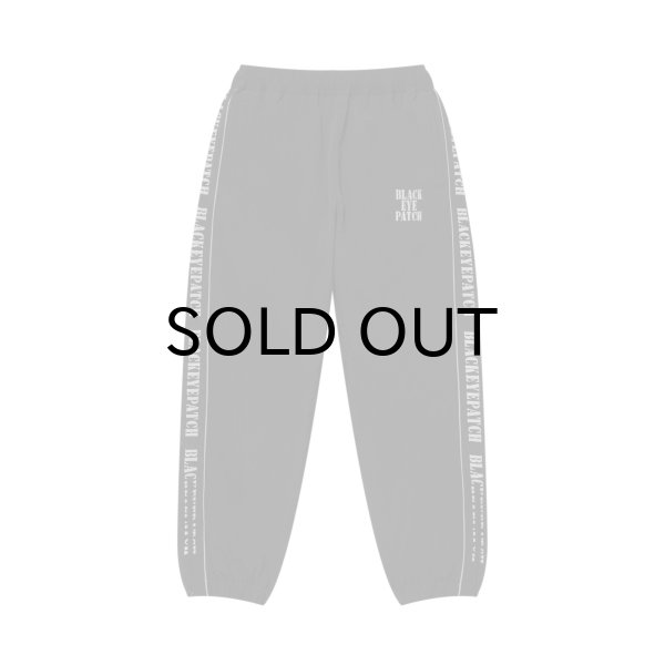 画像1: BLACK EYE PATCH (REFLECTIVE STENCIL LOGO TRACK PANTS) BLACK (1)